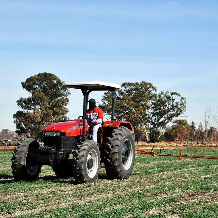 Available at AGRISERV Uganda, the CASE IH JXT Compact and JXT tractor series offer a range of five models from 36 HP to 75 HP, with both 2WD and 4WD options. Engineered for your farming project in Uganda, these tractors deliver exceptional power, speed, lift capacity, and pulling strength. You get extreme performance while maximizing fuel efficiency, ensuring cost-effective and productive daily operations.